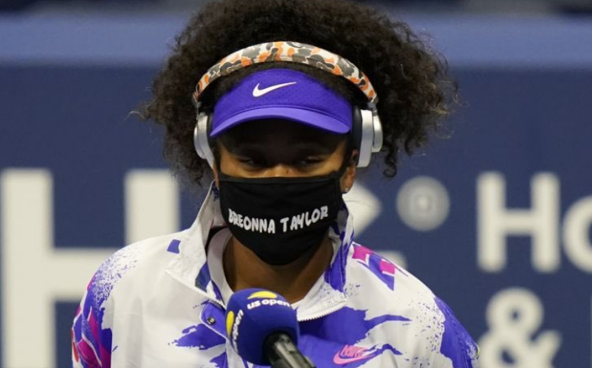 Naomi Osaka at US Open wearing mask with Breonna Taylor written on it.