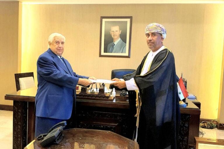 Walid al-Muallem, Syria’s deputy prime minister and foreign minister (L) receives the credentials of Oman’s Ambassador Turki bin Mahmood al-Busaidy, Damascus, October 5, 2020 