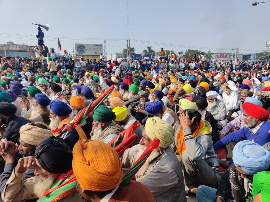 Farmers attending a public meeting at Singhu border on Monday. Image clicked by Mukund Jha