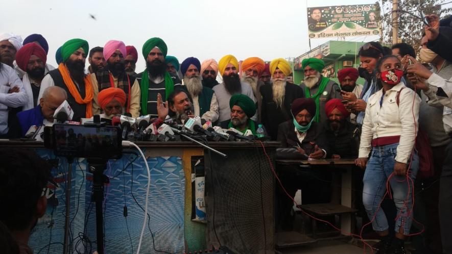 Farm leaders addressing the media in a press conference on Monday. Image clicked by Mukund Jha