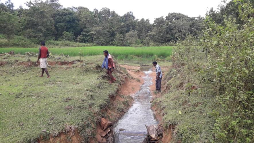 Children have to cross this water stream on their way to merger school. The stream overflows during monsoon