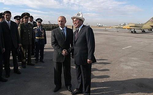 President Putin with then Kyrgyz President Askar Akayev during inauguration ceremony at Russian airbase at Kant, Oct. 23, 2003
