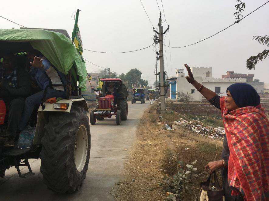 Angoori Devi from Garhi Sampla in Haryana waving at those who were part of the tractor rally on Saturday
