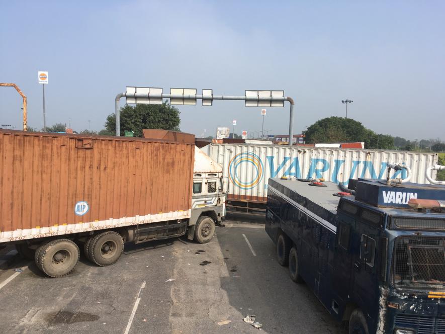 Row of trucks can be seen positioned at the Rajasthan-Haryana border. Image clicked by Ronak Chhabra