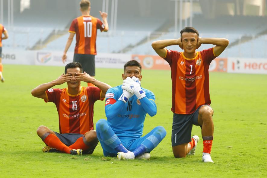 RoundGlass Punjab FC players celebrate a goal vs Gokulam Kerala