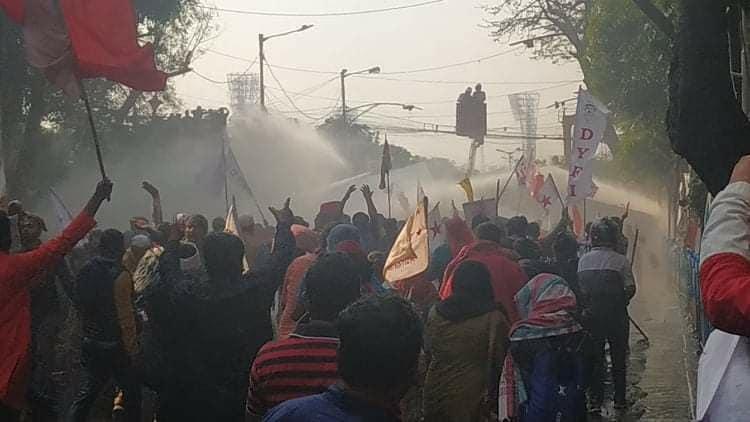 Police used water cannon on youth rally in west bengal 