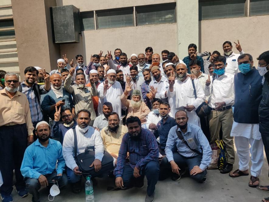A group photo of all after acquittal