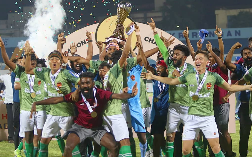 Gokulam Kerala FC players with the I-league trophy