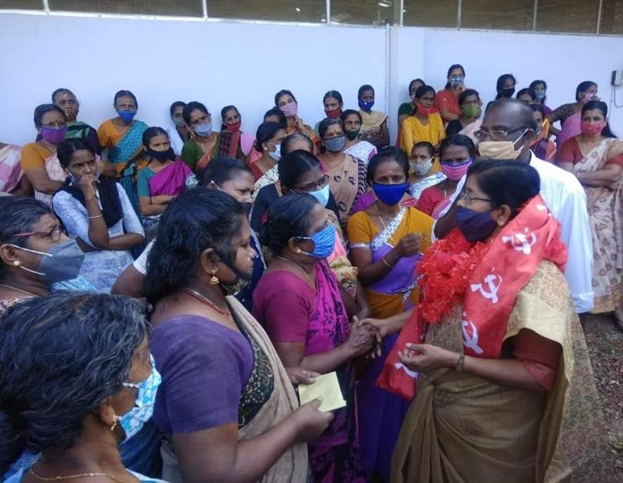 Mercykutty Amma with cashew factory workers during the election campaign