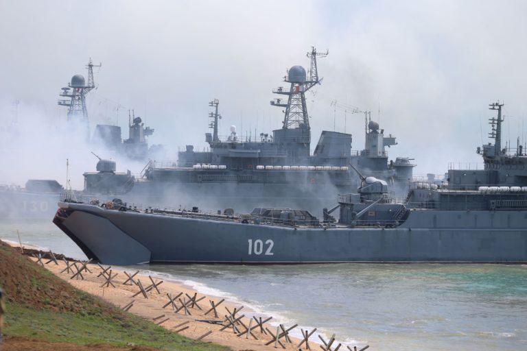 Russian military’s armoured vehicles roll into landing vessels after drill in Crimea, Black Sea, April 23, 2021