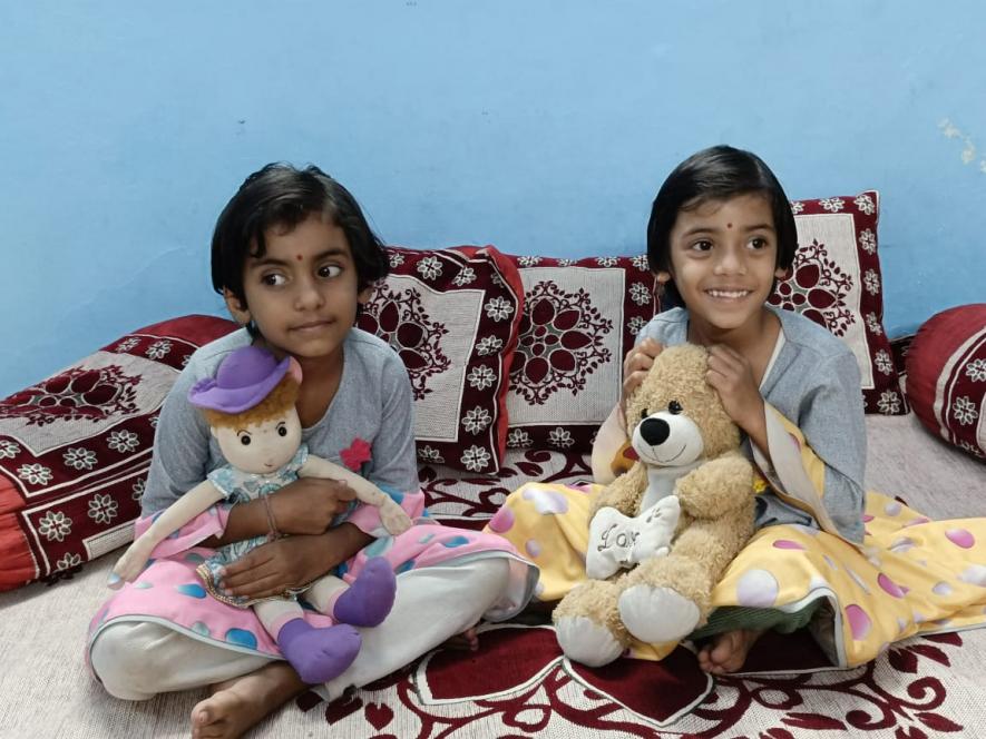Mahi and Ruhi at their grandfather's house.