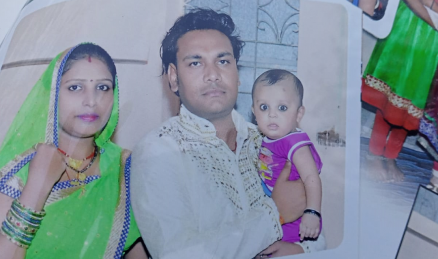Uday Jaiswal with his wife and a kid.