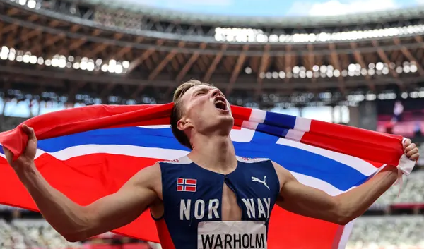 Karsten Warholm of Norway celebrates his record and gold medal at Tokyo Olympics