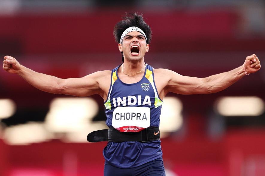 Neeraj Chopra celebrates his gold medal at Tokyo Olympics