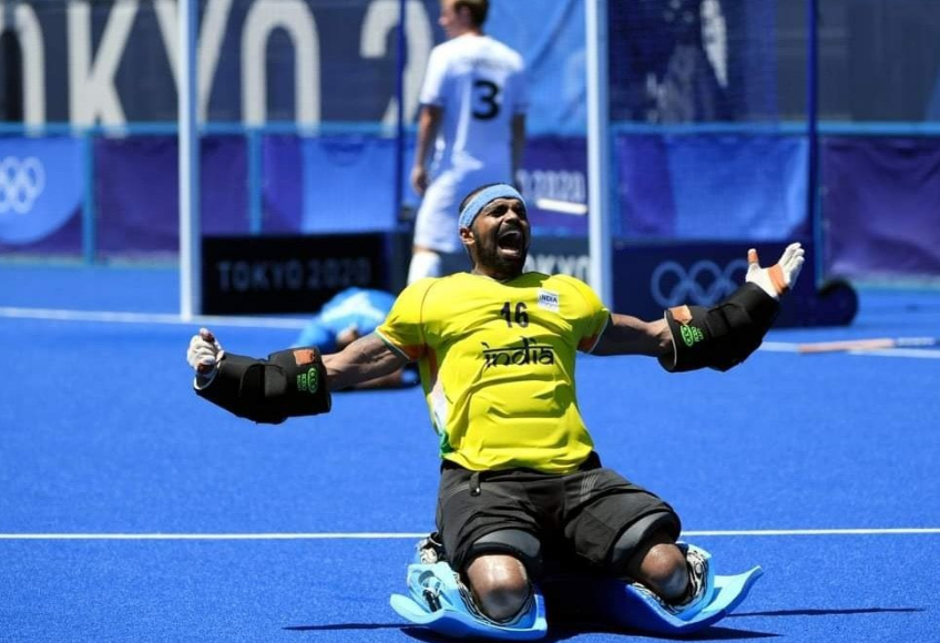 Indian hockey team goalkeeper PR Sreejesh celebrates after winning bronze in hockey at the Tokyo Olympics