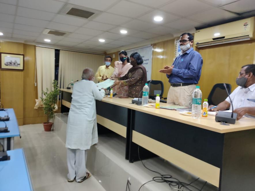 Nayagarh Collector Dr Poma Tudu, handing over CFR (Community forests resources) titles to Arakhita Sahoo, Secretary of Maa Maninag Jangle Surakhya Parishad. He received CFR titles on behalf of other villagers