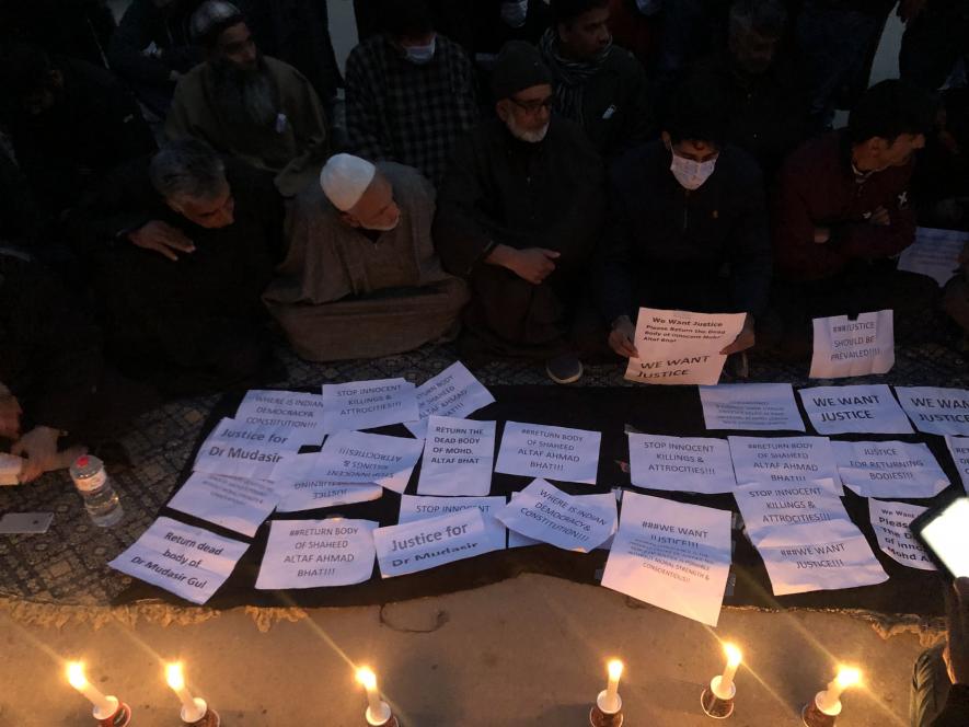 Candle light protest by two families at press enclave Srinagar 