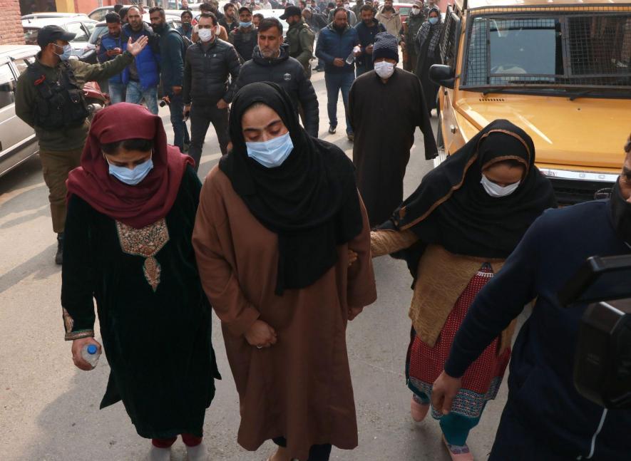 Family members of Dr Mudasir Gull in press colony, Srinagar. Courtesy Kamran Yousuf.