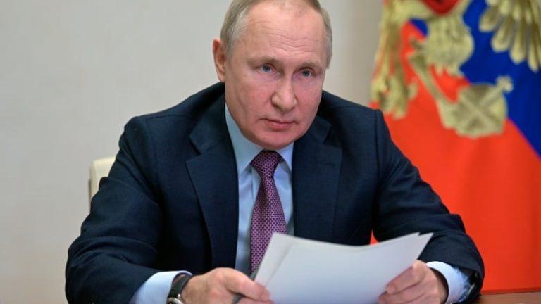 Russian President Vladimir Putin attends a cabinet meeting via video conference outside Moscow, December 24, 2021