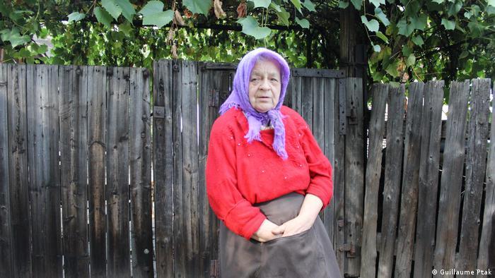 Retiree Tarasova lives by the polluted Komyshuvakha River, and can no longer use it to water her garden