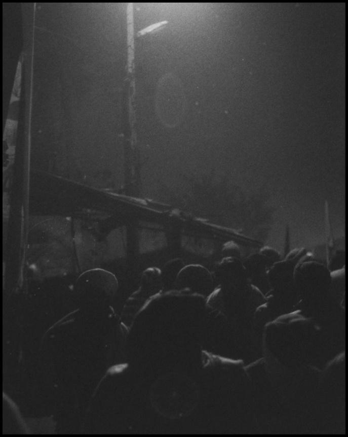 Farmers head to their tents after a chaotic evening.
