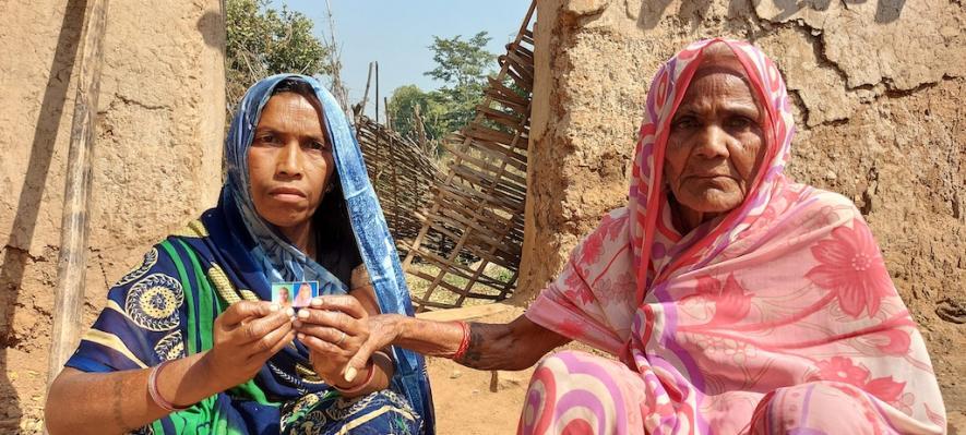 Amravati (L) with her mother-in-law Manghi (R). Both lost their husbands to malaria.