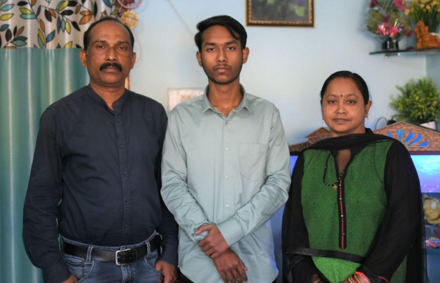 Aman Sarvesh with his parents