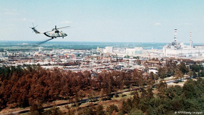 An army helicopter tries to help diffuse radiation during the 1986 Chernobyl nuclear disaster. Now the military could threaten a meltdown if nuclear plants are caught up in the Ukraine war
