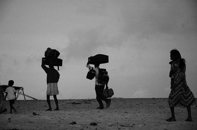 A group of Sri Lankan Tamil refugees arrives in Rameshwaram island of Tamil Nadu after a risky 30-mile boat ride across the Palk Straits.