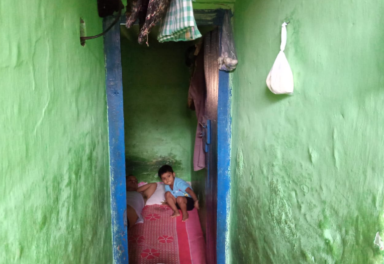 Photo: A narrow hallway in Arvind's house in the slum in Noida.