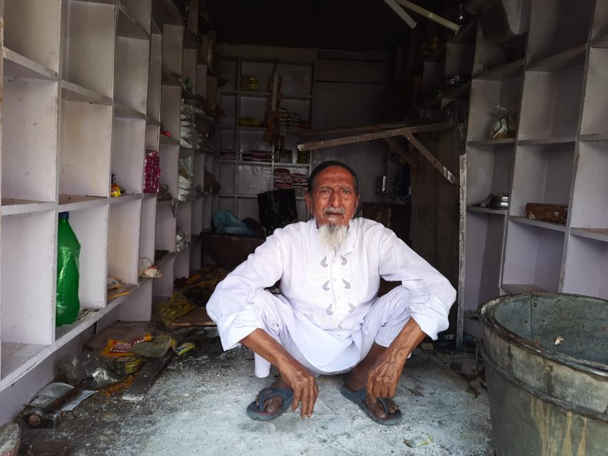 Nazmuddin at his shop.