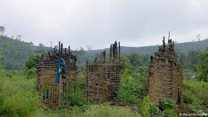 The remains of a burned house in the destroyed viallge of Bugamande