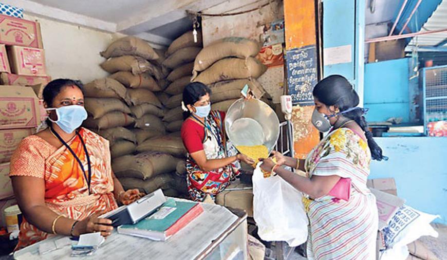 Women workers in a fair price shop. Image courtesy: Theekkathir