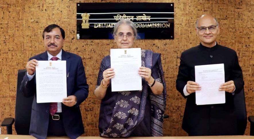Srinagar, May 05 (ANI): Jammu and Kashmir Delimitation Commission signs the final order for restructuring the Assembly seats in the Union Territory, in Srinagar on Thursday.