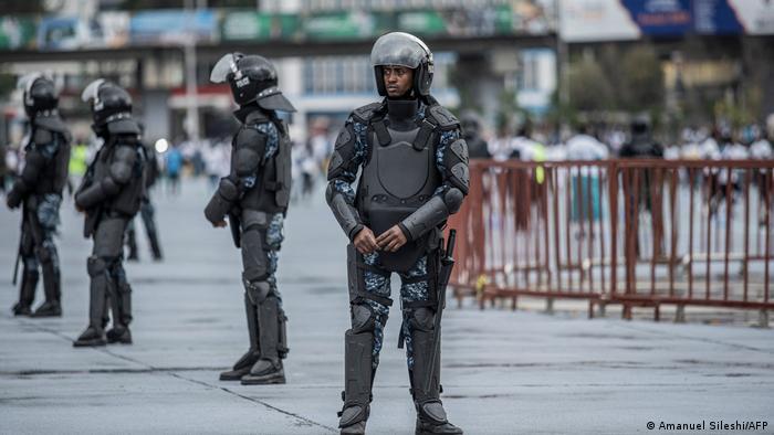 Ethiopian federal police officers stand guard as Muslims mark Eid al-Fitr in Addis Ababa 