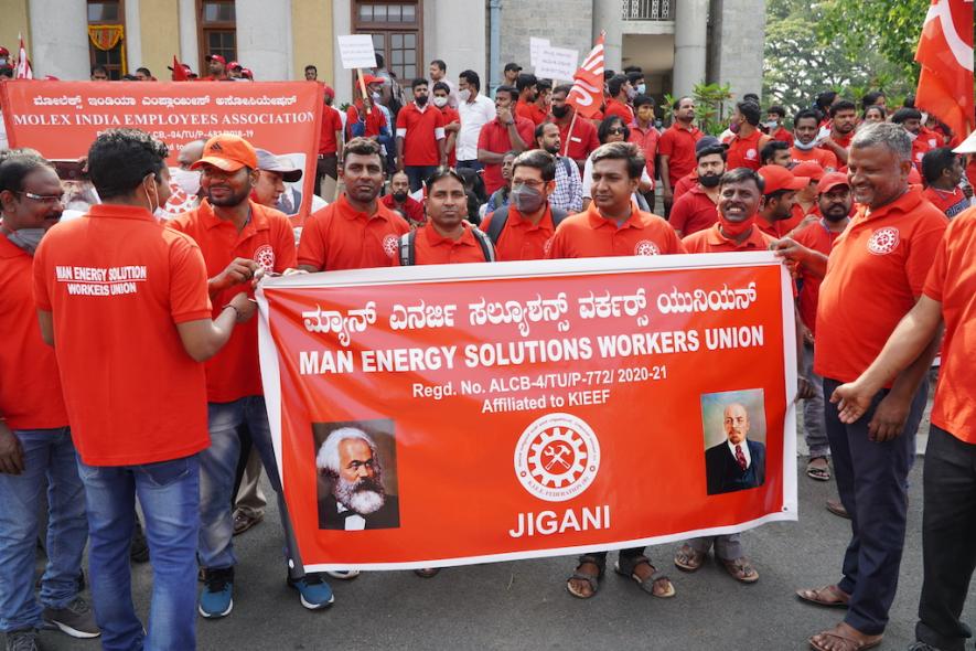 Workers from hundreds of industrial units took over the streets of Bengaluru