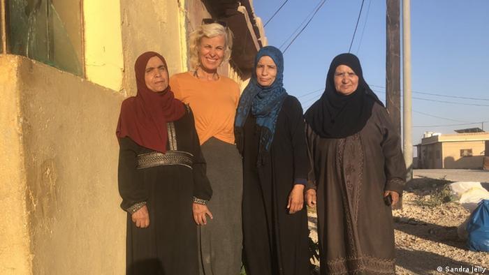 Social entrepreneur Sandra Jelly (second from left) helps Bedouin women who weave for their social enterprise