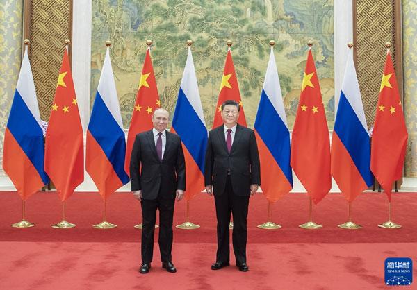 Chinese President Xi Jinping (R) held talks with Russian President Vladimir Putin, Beijing, February 4, 2022