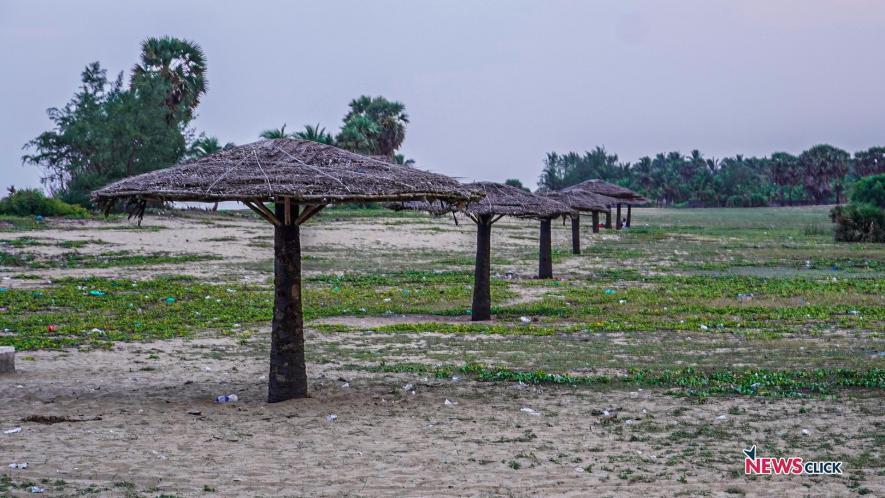 Tourist spot in Pudukuppam filled with plastic waste.