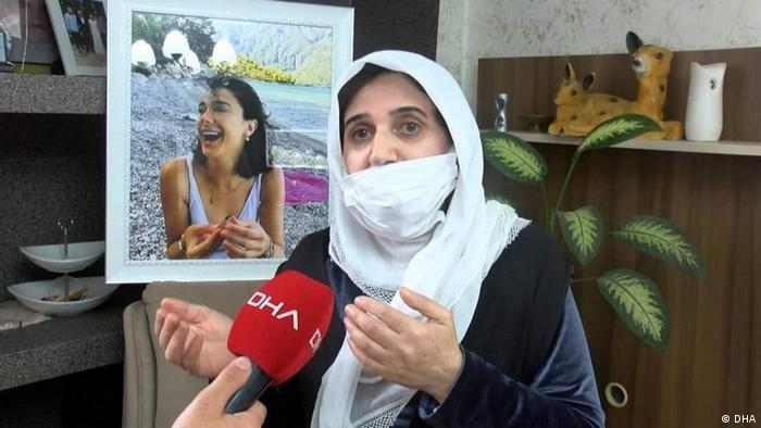 Sefika Gultekin, Pinar's mother, is seen here with a photo of her murdered daughter