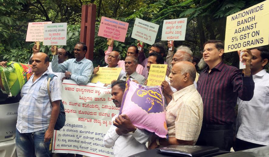 KSRMA members protest against 5 percent GST on food grains