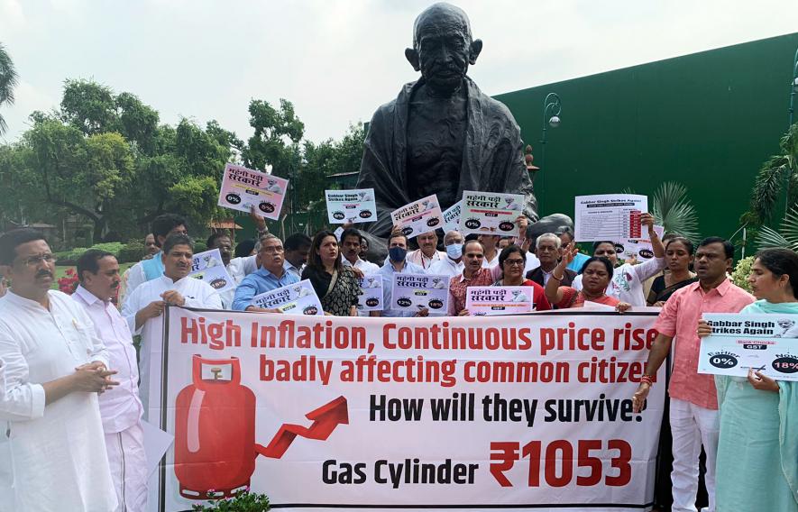 Congress MP Rahul Gandhi joins the Opposition's protest over the issues of inflation and price rise, near the Gandhi statue in Parliament 