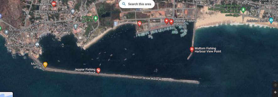 The western backwater structure in the sea, cited as the reason for the change in ocean current (the affected Azhikkal village is on the right end) (Screenshot from Google Maps of the Jeppiar fishing harbour and the neighbouring fishing hamlets).