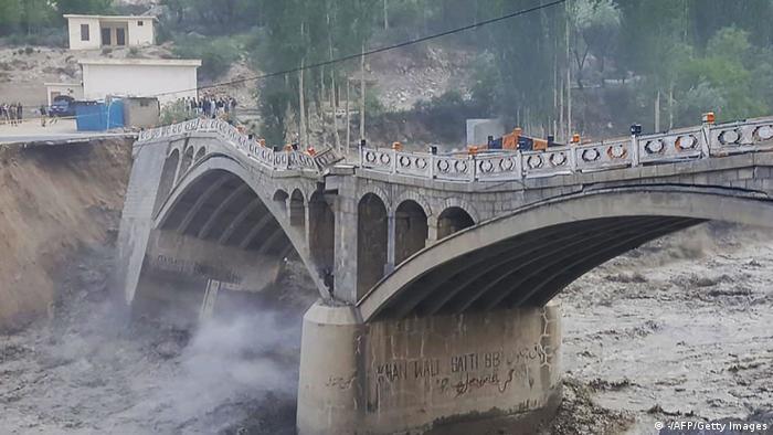 A bridge in Hassanabad village collapsed due to flash floods created after a glacial lake outburst