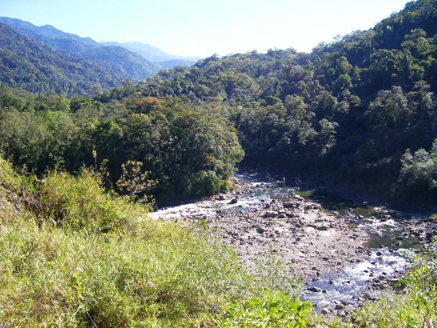 A view of the Namdapha Tiger Reserve near its eastern end with the Noadihing river cutting across. The forests have some of the northernmost evergreen forests in the world.