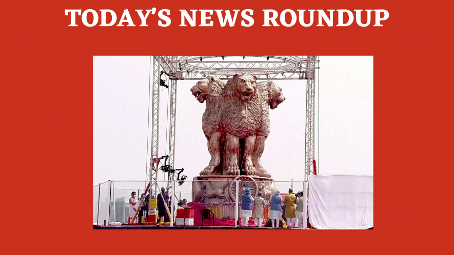 Prime Minister Narendra Modi unveils the 6.5m long bronze National Emblem cast on the roof of the New Parliament Building, in New Delhi on Monday. 