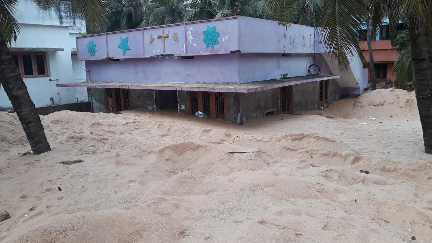 A house submerged almost half in sand owing to high tides and strong winds. (Image courtesy: Dr Vareethiah Konstantine).