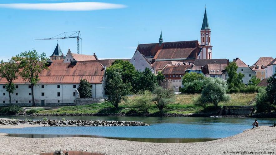 The water in the Danube — seen here near Straubing in Bavaria — isn't just very low, it's also too hot