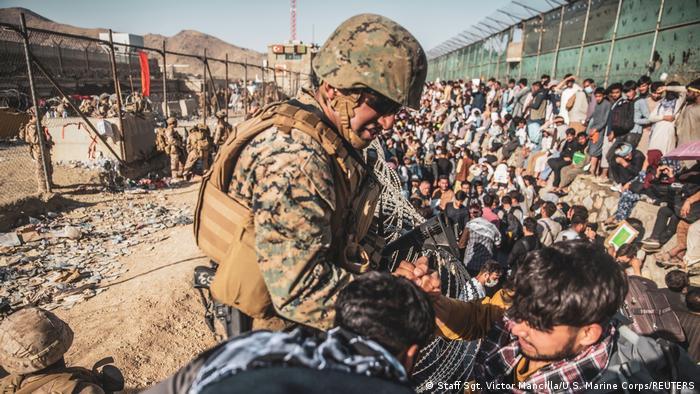 Desperation: There were chaotic scenes at Kabul airport when the Taliban regained control of the capital