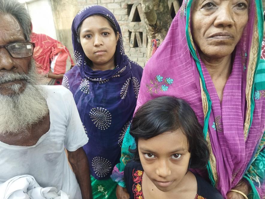Bearded man is  the father and mother and daughter and widow of Abdul matin mahaldar